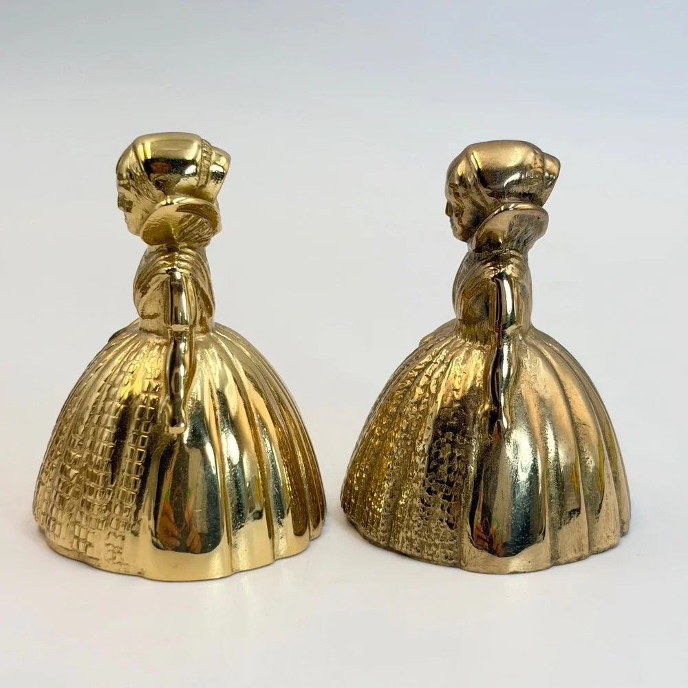 2 Vintage Brass Dutch Girl Dinner Table Hand Bell Figural Mantle Decor Regency